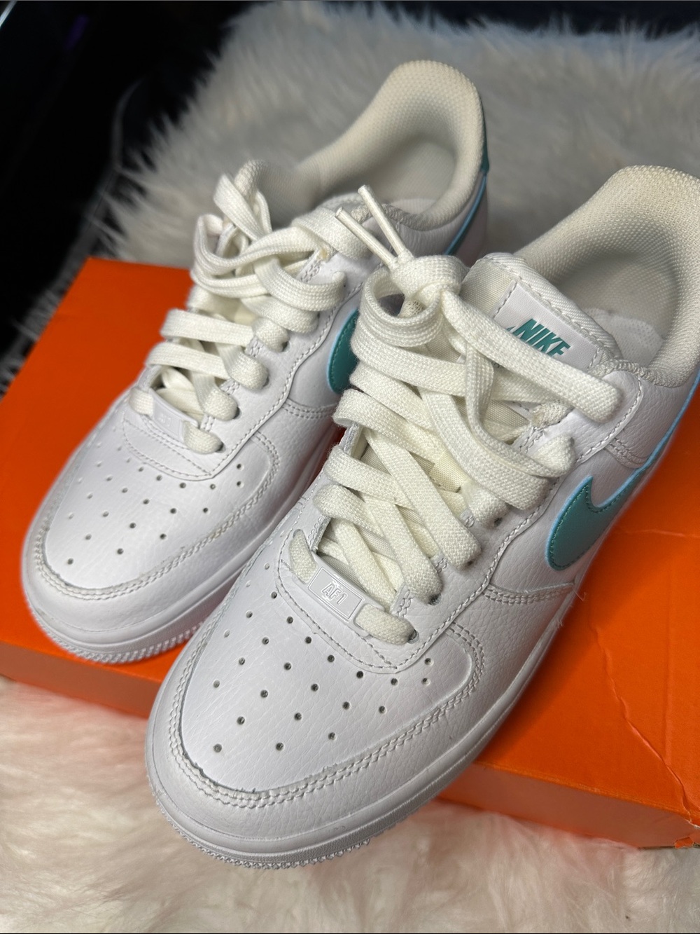 Nike White Sneakers with Teal Swoosh